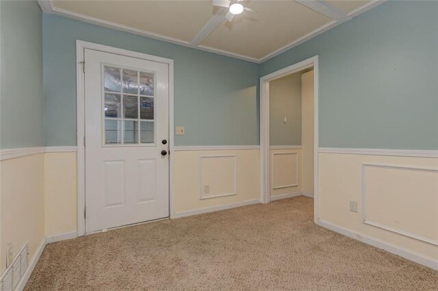 189 Meadow Spring Dr, Temple, GA 30179 - doorway to outside with a wainscoted wall, carpet floors, ceiling fan, and crown molding