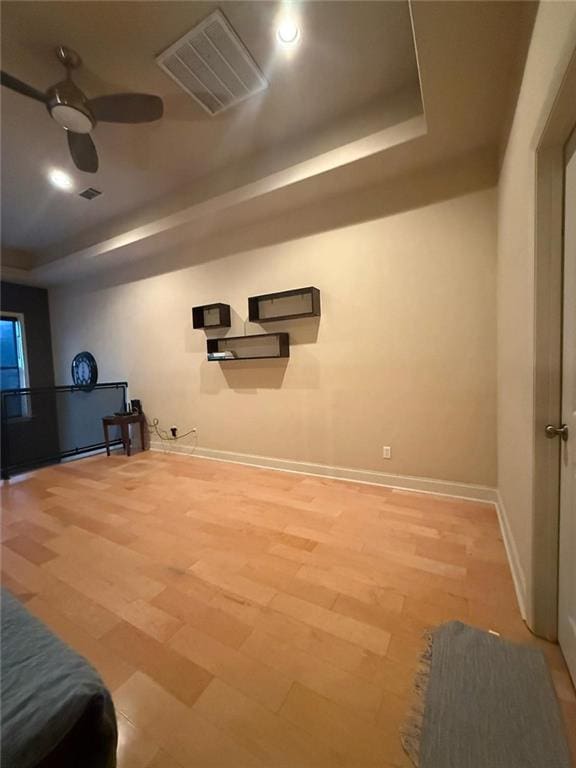 interior space featuring ceiling fan