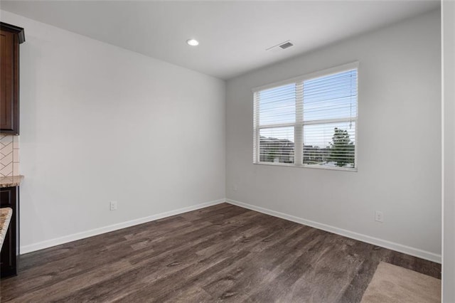 2537 Sori Dr, Buford, GA 30519 - spare room featuring dark wood finished floors, baseboards, recessed lighting, and a fireplace