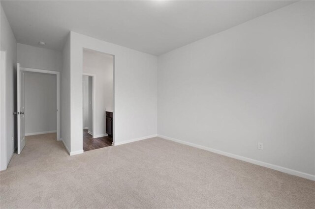 2537 Sori Dr, Buford, GA 30519 - unfurnished bedroom with carpet flooring and baseboards