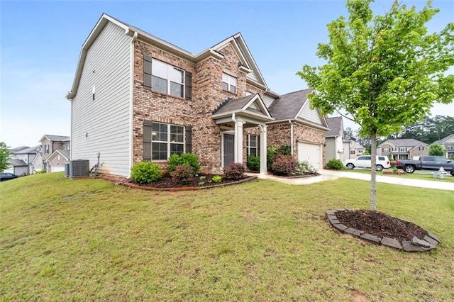 2537 Sori Dr, Buford, GA 30519 - traditional home with brick siding, concrete driveway, a front yard, and an attached garage