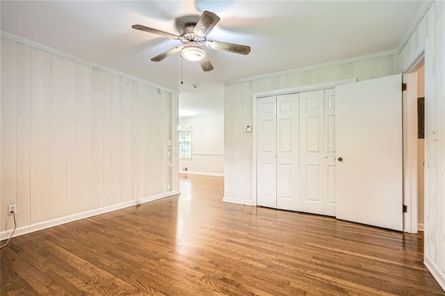 739 Pinehill Dr SE, Smyrna, GA 30080 - unfurnished bedroom with wood finished floors, ornamental molding, a closet, and ceiling fan