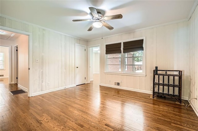 739 Pinehill Dr SE, Smyrna, GA 30080 - spare room with crown molding, a ceiling fan, and wood finished floors
