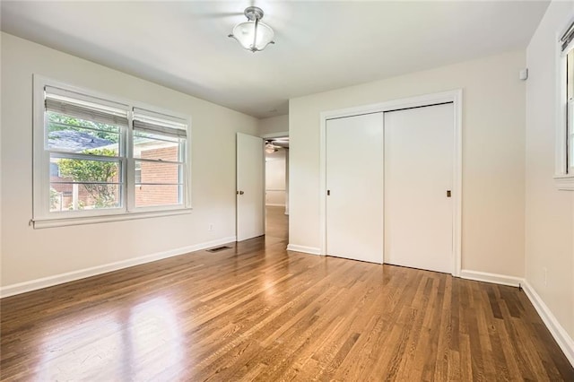 739 Pinehill Dr SE, Smyrna, GA 30080 - unfurnished bedroom with wood finished floors and a closet