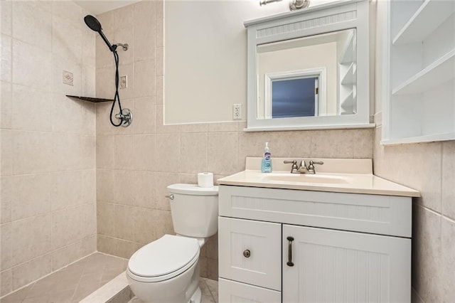 739 Pinehill Dr SE, Smyrna, GA 30080 - full bathroom featuring a tile shower, tile walls, and vanity