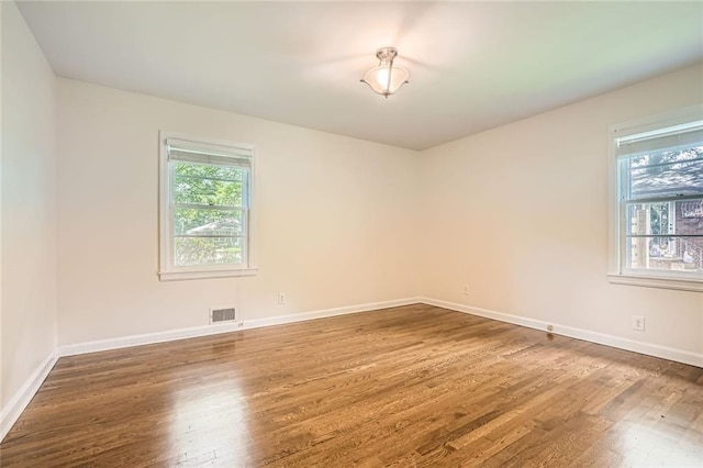 739 Pinehill Dr SE, Smyrna, GA 30080 - empty room with wood finished floors