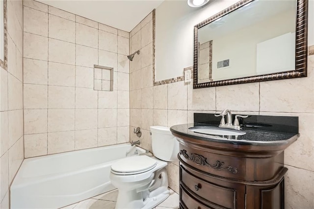 739 Pinehill Dr SE, Smyrna, GA 30080 - full bathroom with tile walls, shower / bathtub combination, vanity, and tile patterned flooring