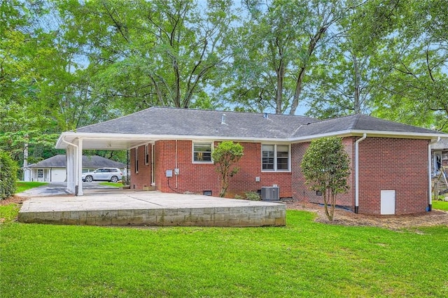 739 Pinehill Dr SE, Smyrna, GA 30080 - back of house featuring a yard, brick siding, and an attached carport