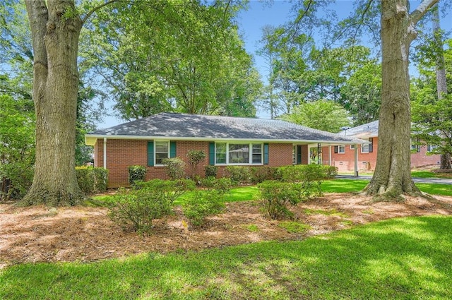 739 Pinehill Dr SE, Smyrna, GA 30080 - ranch-style house featuring brick siding and a front lawn