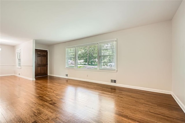 739 Pinehill Dr SE, Smyrna, GA 30080 - empty room with dark wood-style floors and baseboards