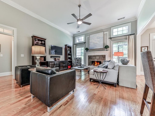 1076 Pinyan Ln, Canton, GA 30115 - living area featuring light wood finished floors, a ceiling fan, ornamental molding, and healthy amount of natural light