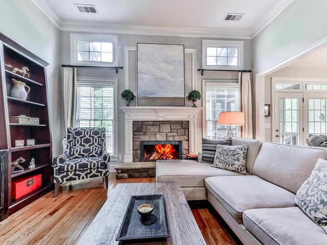1076 Pinyan Ln, Canton, GA 30115 - living room with wood finished floors, crown molding, and a fireplace