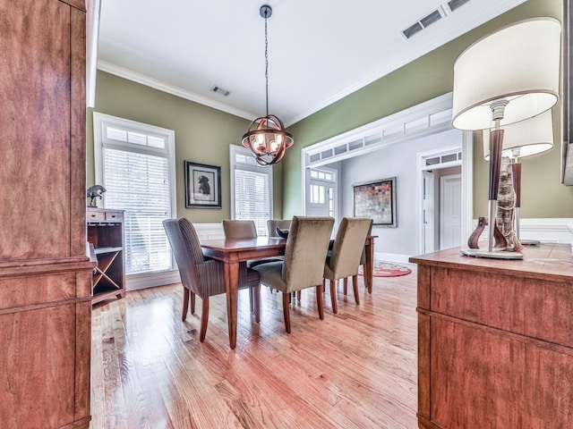 1076 Pinyan Ln, Canton, GA 30115 - dining room with light wood-style flooring and ornamental molding