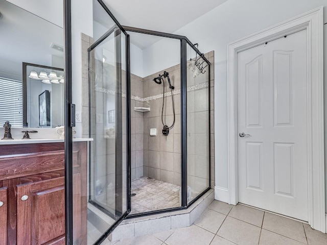 1076 Pinyan Ln, Canton, GA 30115 - full bath featuring tile patterned floors, a shower stall, and vanity