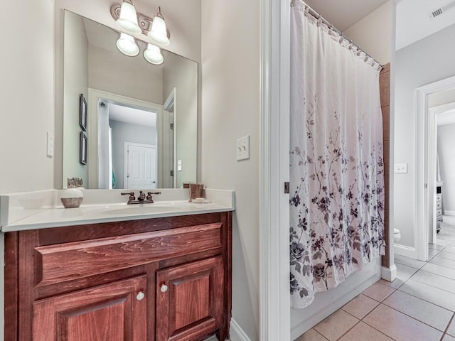 1076 Pinyan Ln, Canton, GA 30115 - full bathroom with tile patterned floors, vanity, and shower / bath combo
