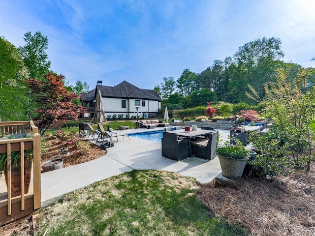 1076 Pinyan Ln, Canton, GA 30115 - outdoor pool with a patio area