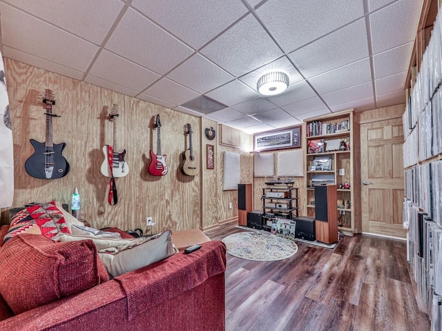 1076 Pinyan Ln, Canton, GA 30115 - living room with a paneled ceiling, wood walls, and wood finished floors