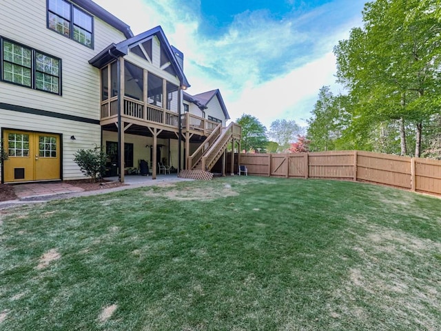 1076 Pinyan Ln, Canton, GA 30115 - rear view of property featuring a sunroom, stairway, a fenced backyard, and a deck