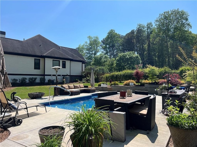 1076 Pinyan Ln, Canton, GA 30115 - swimming pool featuring a patio and an outdoor hangout area