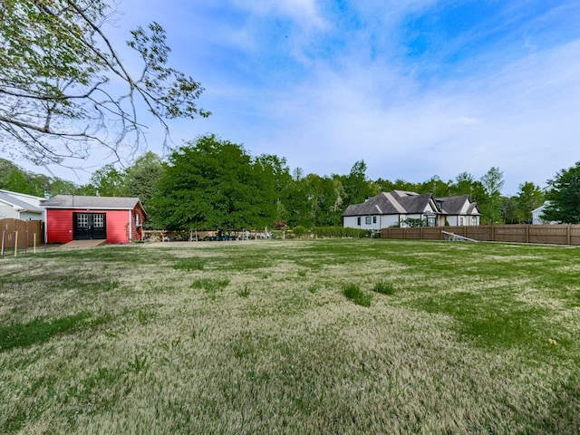 1076 Pinyan Ln, Canton, GA 30115 - fenced backyard with an outbuilding