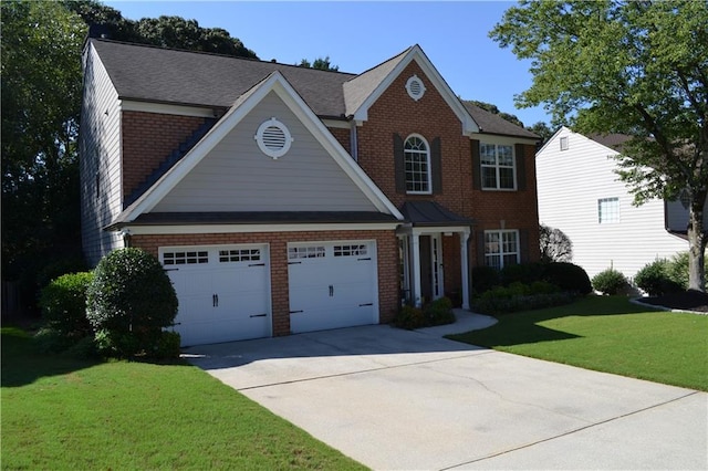 view of front facade featuring a garage and a front lawn