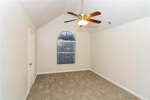 137 Legend Creek Dr, Canton, GA 30114 - carpeted empty room with a ceiling fan, vaulted ceiling, and baseboards
