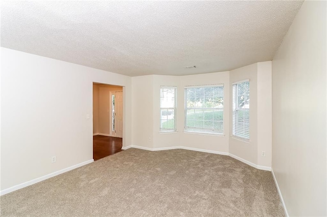 137 Legend Creek Dr, Canton, GA 30114 - carpeted empty room featuring a textured ceiling and baseboards