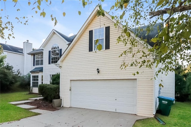 137 Legend Creek Dr, Canton, GA 30114 - view of front of home featuring an attached garage, driveway, and a front yard