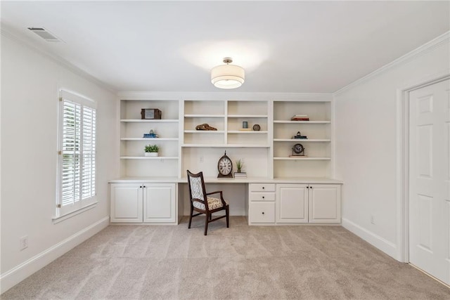 office space featuring built in study area, ornamental molding, visible vents, and light carpet
