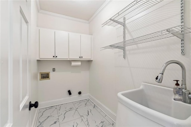 laundry room featuring cabinet space, a sink, hookup for a washing machine, marble finish floor, and baseboards