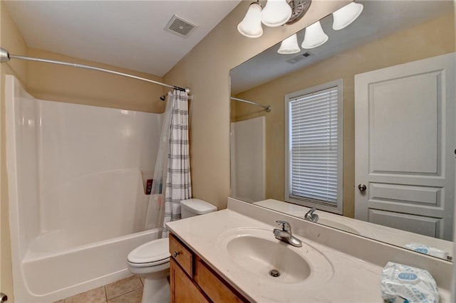 full bathroom with shower / tub combo with curtain, vanity, toilet, and tile patterned flooring