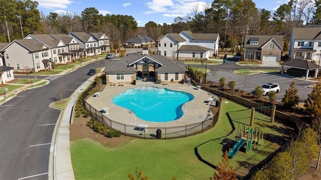 view of pool with a playground, a gazebo, and a patio