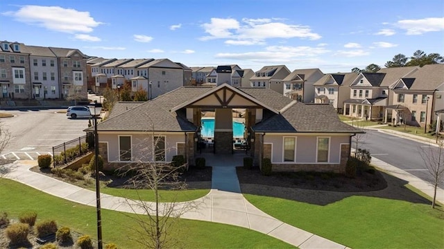 view of front of home with a front yard