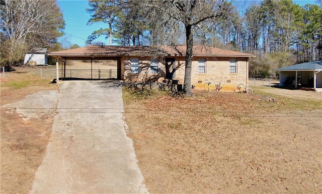 view of front facade with a carport