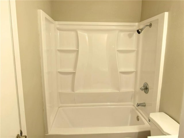 bathroom with  shower combination and toilet