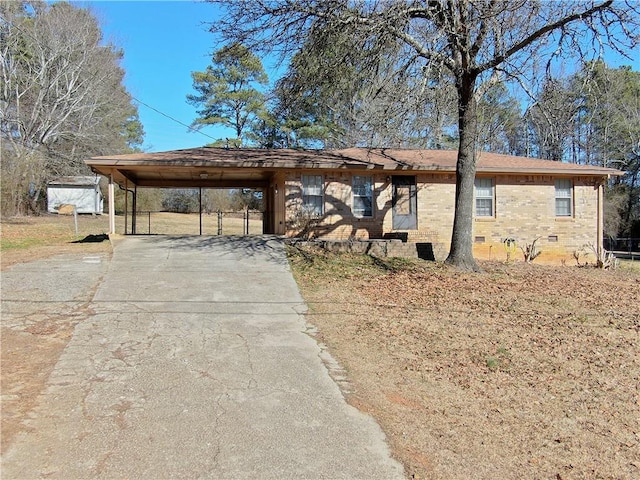 view of front of home with a carport