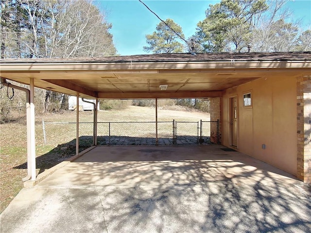 view of patio / terrace with a carport