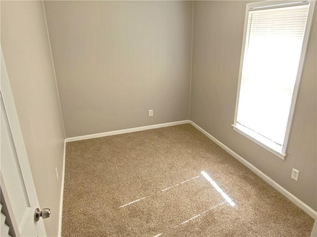 view of carpeted spare room