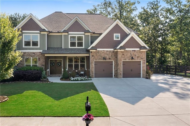 4 Bluff Ct, Cartersville, GA 30120 - craftsman-style home with concrete driveway, stone siding, a garage, board and batten siding, and roof with shingles