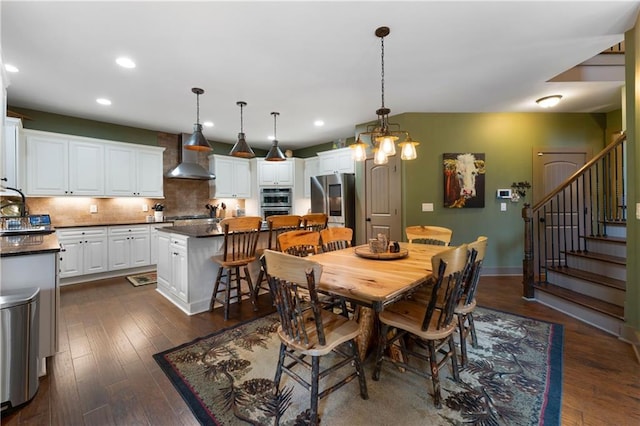 4 Bluff Ct, Cartersville, GA 30120 - dining space featuring recessed lighting, stairway, and dark wood finished floors