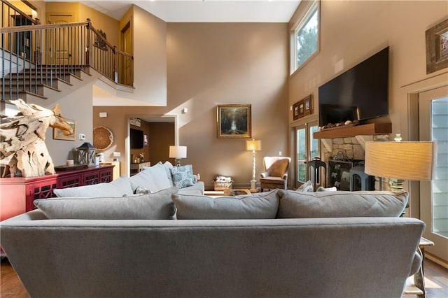 4 Bluff Ct, Cartersville, GA 30120 - living room with a towering ceiling, plenty of natural light, wood finished floors, and stairs