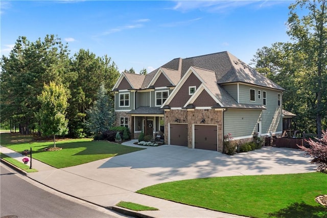 4 Bluff Ct, Cartersville, GA 30120 - craftsman inspired home with stone siding, a front yard, concrete driveway, and a shingled roof