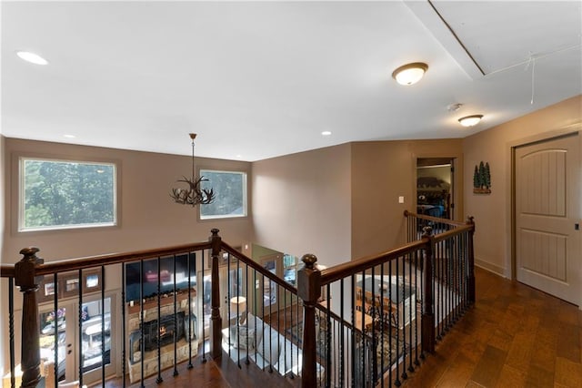 4 Bluff Ct, Cartersville, GA 30120 - hall featuring attic access, an upstairs landing, plenty of natural light, a chandelier, and recessed lighting