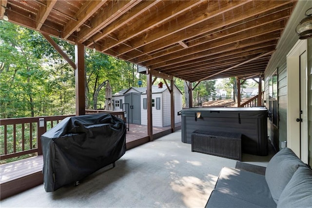 4 Bluff Ct, Cartersville, GA 30120 - view of patio / terrace with a storage shed, a deck, a hot tub, and area for grilling