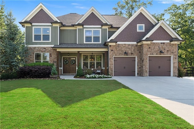 4 Bluff Ct, Cartersville, GA 30120 - craftsman-style house featuring board and batten siding, stone siding, driveway, a front lawn, and a garage