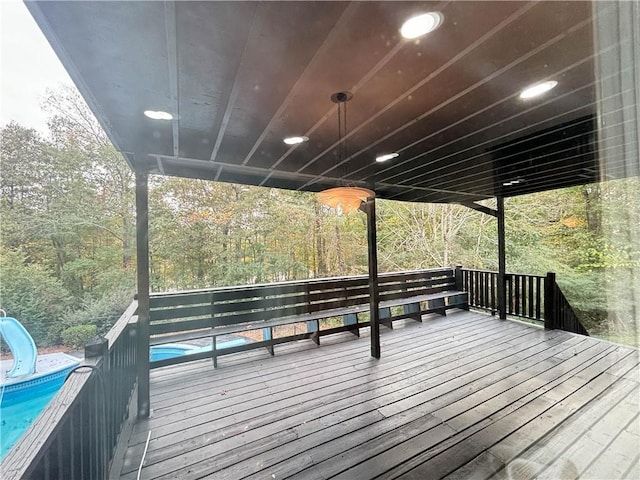 deck with an outdoor pool