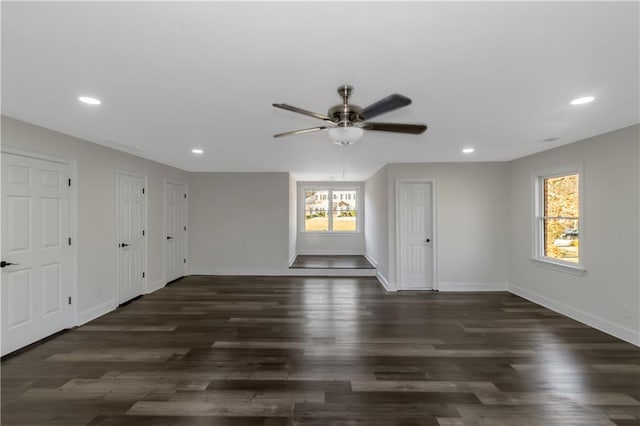 unfurnished room with recessed lighting, a ceiling fan, baseboards, and dark wood-style flooring