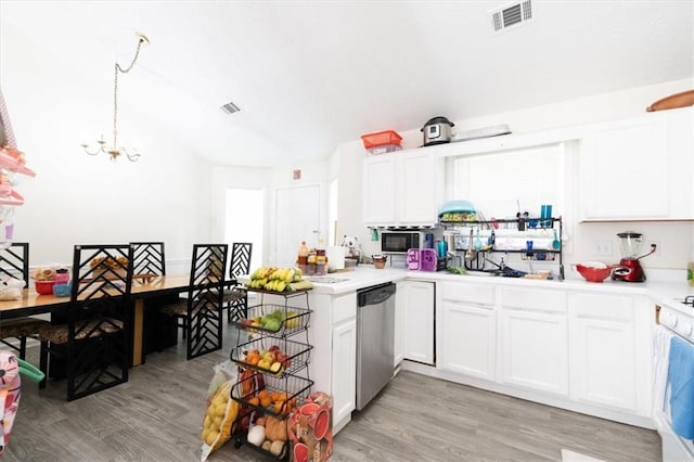 kitchen featuring appliances with stainless steel finishes, light hardwood / wood-style flooring, white cabinets, and decorative light fixtures