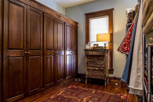 hall featuring dark wood finished floors