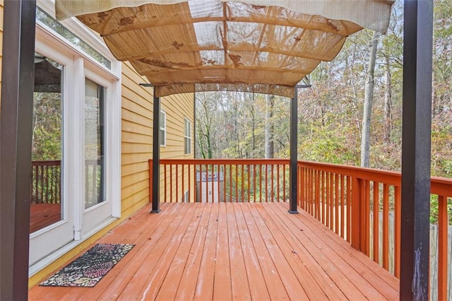 wooden deck featuring a pergola